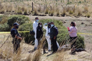 Encuentran el cuerpo de un hombre degollado y calcinado en Zinacantepec