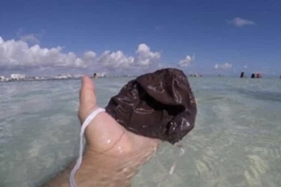 Playas de Cancún contaminadas por cubrebocas