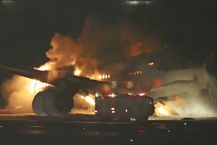 Chocan aviones en aeropuerto de Tokio; mueren 5 tripulantes