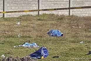 Lo matan a pedradas en baldío de San Miguel Totoltepec