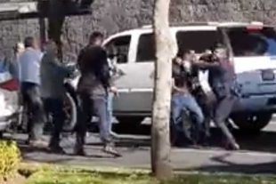 Escoltas armados golpean a hombre frente a niña y mujer en colonia Lomas Altas, CDMX