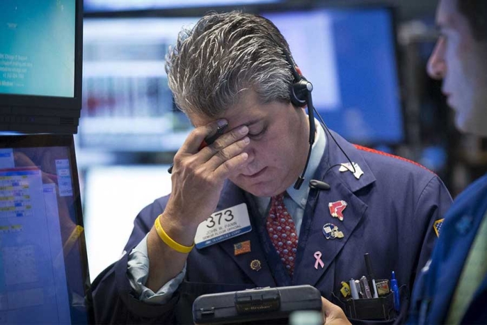 Se hunde Wall Street tras histórico aumento a tasa de la Fed