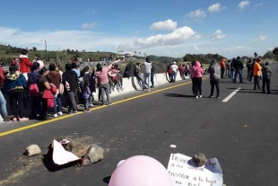 Cierran autopista a Ixtapan de la Sal por asesinato de menor