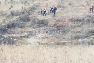 Macabro; encuentran partes humanas en terreno de Otzolotepec