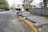 Abandonan cabina telefónica en mal estado en colonia Universidad