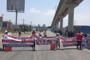 Familiares de desaparecidos paralizaron carretera Mex-Tol, exigen atención de FGJEM