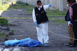 Matan a joven y lo dejan en zona del Tren Interurbano