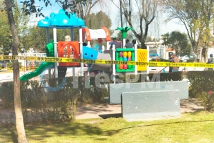 Hallan a joven sin vida en el área de juegos en parque en Toluca