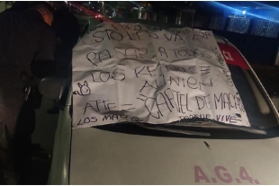 Dejan cadáver embolsado en taxi de Coacalco