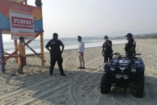 Por rebrote de COVID cierran playas en Oaxaca