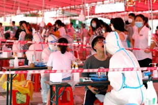 Refuerzan medidas en China para frenar rebrote de contagios por variante Delta