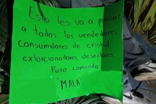 En el lugar fue encontrada una cartulina con un mensaje intimidatorio