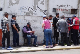 Cae elevador de carga y mata a empleado en bodega de Toluca