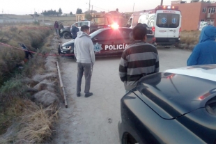 Muere al caer con su motoneta a canal de aguas negras en Otzolotepec