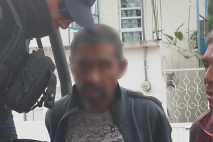 Ladrón queda atorado después de robar  en una casa de Metepec