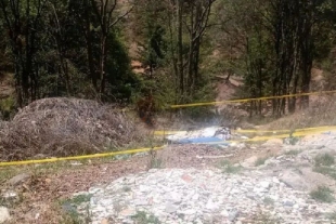 Abandonan cadaver maniatado en Xonacatlán